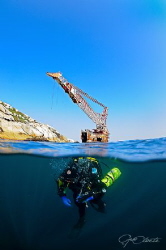 ~ Helping Hand ~
Diver descending on the wreck of the Bo... by Geo Cloete 